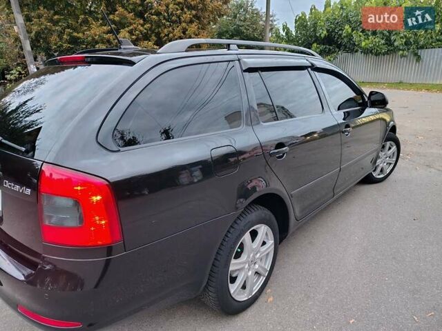 Шкода Октавія 2011 у Борисполе на Automoto.ua Чорний Шкода Октавія, об'ємом двигуна 1.6 л та пробігом 348 тис. км за 8700 $, фото 14 на Automoto.ua