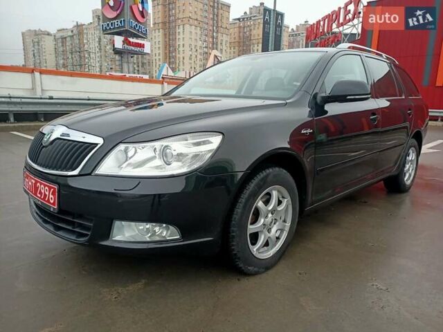 Черный Шкода Октавия, объемом двигателя 1.8 л и пробегом 186 тыс. км за 8299 $, фото 1 на Automoto.ua