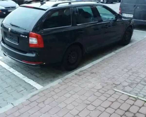 Чорний Шкода Октавія, об'ємом двигуна 2 л та пробігом 266 тис. км за 11500 $, фото 3 на Automoto.ua