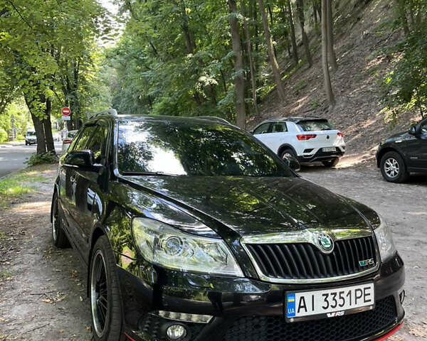 Черный Шкода Октавия, объемом двигателя 2 л и пробегом 200 тыс. км за 11399 $, фото 1 на Automoto.ua