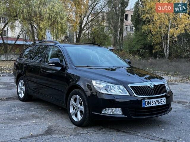 Шкода Октавия 2011 в Конотопе на Automoto.ua Черный Шкода Октавия, объемом двигателя 1.8 л и пробегом 197 тыс. км за 8600 $, фото 14 на Automoto.ua