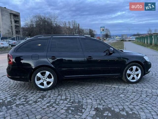 Черный Шкода Октавия, объемом двигателя 2 л и пробегом 30 тыс. км за 8099 $, фото 3 на Automoto.ua