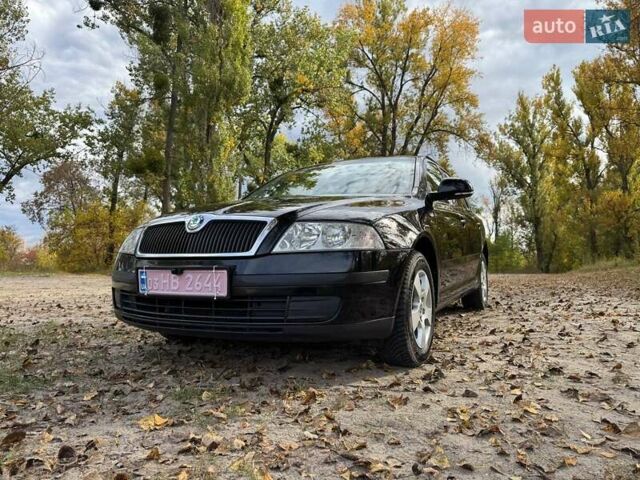 Шкода Октавия 2011 в Полтаве на Automoto.ua Черный Шкода Октавия, объемом двигателя 1.6 л и пробегом 220 тыс. км за 7600 $, фото 2 на Automoto.ua