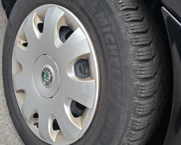 Чорний Шкода Октавія, об'ємом двигуна 1.6 л та пробігом 221 тис. км за 8600 $, фото 78 на Automoto.ua