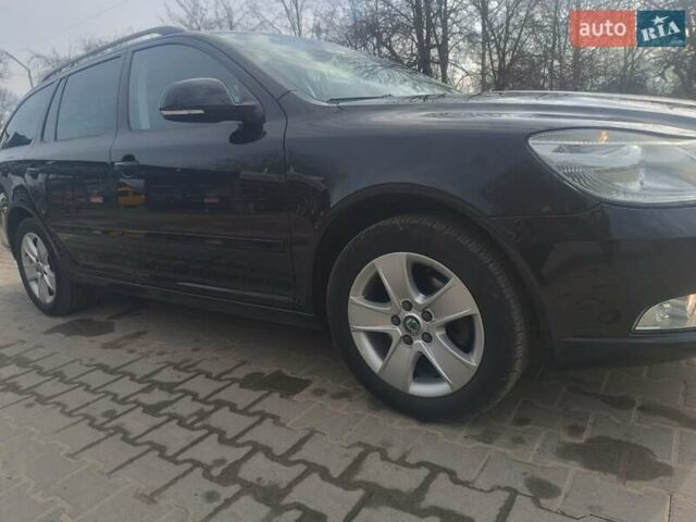 Черный Шкода Октавия, объемом двигателя 1.2 л и пробегом 214 тыс. км за 6900 $, фото 2 на Automoto.ua
