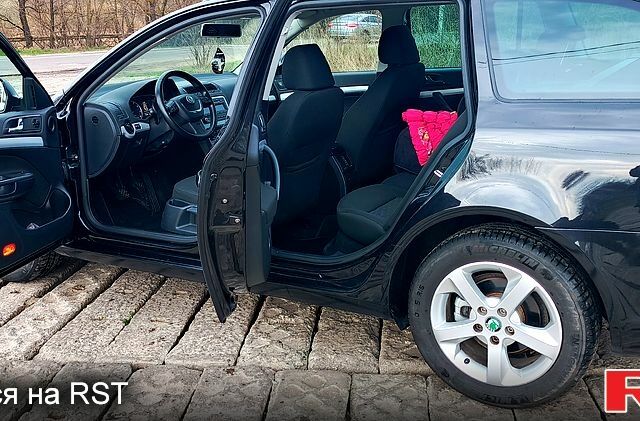 Чорний Шкода Октавія, об'ємом двигуна 14 л та пробігом 179 тис. км за 8300 $, фото 8 на Automoto.ua