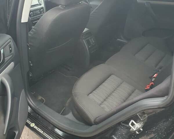 Черный Шкода Октавия, объемом двигателя 1.6 л и пробегом 220 тыс. км за 7950 $, фото 9 на Automoto.ua