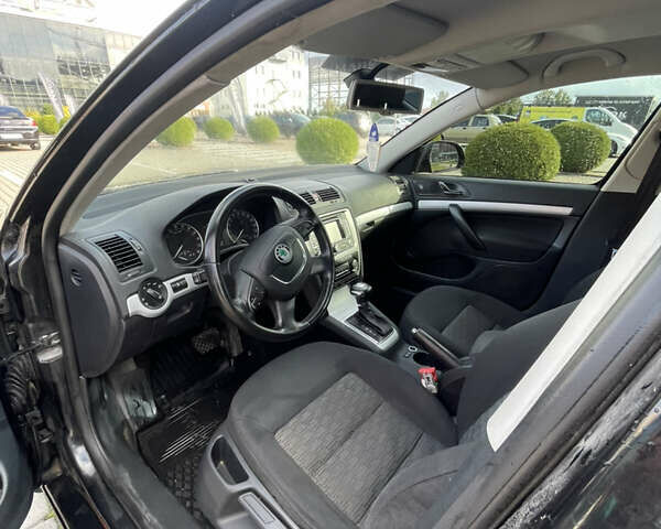 Черный Шкода Октавия, объемом двигателя 2 л и пробегом 280 тыс. км за 9200 $, фото 4 на Automoto.ua