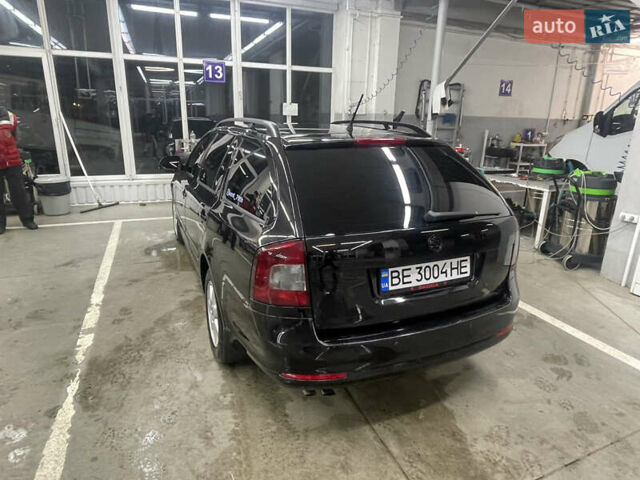 Чорний Шкода Октавія, об'ємом двигуна 1.4 л та пробігом 225 тис. км за 7999 $, фото 7 на Automoto.ua