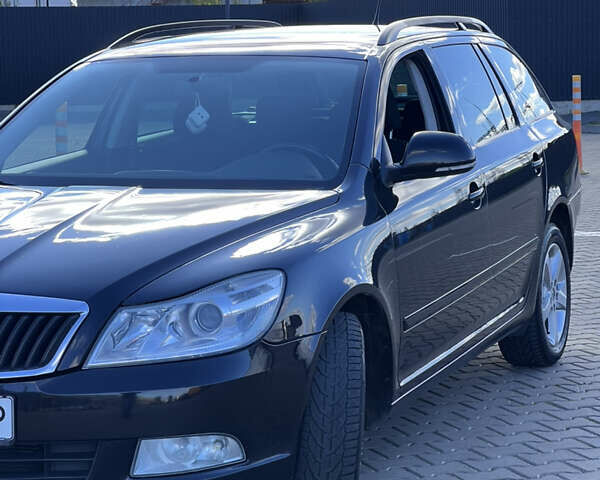 Черный Шкода Октавия, объемом двигателя 2 л и пробегом 232 тыс. км за 8999 $, фото 1 на Automoto.ua