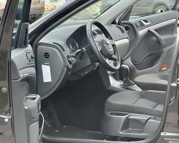 Черный Шкода Октавия, объемом двигателя 1.6 л и пробегом 157 тыс. км за 11390 $, фото 24 на Automoto.ua