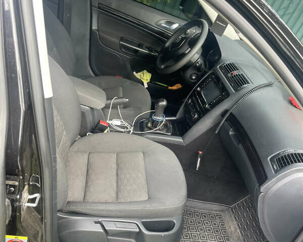 Шкода Октавия 2011 в Полтаве на Automoto.ua Черный Шкода Октавия, объемом двигателя 1.97 л и пробегом 254 тыс. км за 10500 $, фото 10 на Automoto.ua