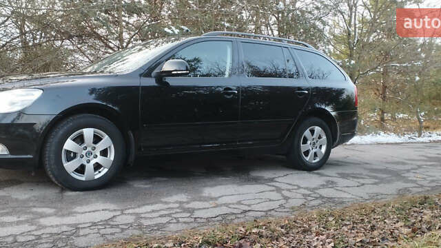 Черный Шкода Октавия, объемом двигателя 1.4 л и пробегом 231 тыс. км за 6999 $, фото 3 на Automoto.ua