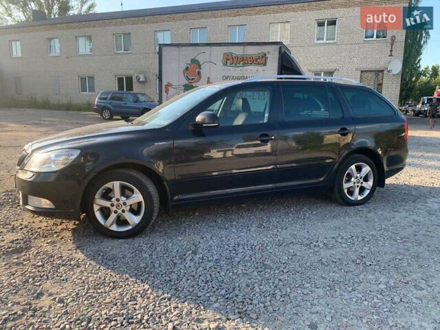 Чорний Шкода Октавія, об'ємом двигуна 1.2 л та пробігом 210 тис. км за 7500 $, фото 7 на Automoto.ua