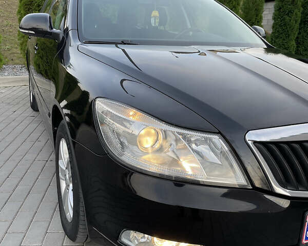 Чорний Шкода Октавія, об'ємом двигуна 1.6 л та пробігом 194 тис. км за 9399 $, фото 39 на Automoto.ua