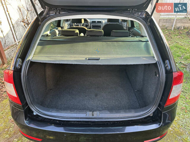 Черный Шкода Октавия, объемом двигателя 1.6 л и пробегом 200 тыс. км за 8800 $, фото 5 на Automoto.ua