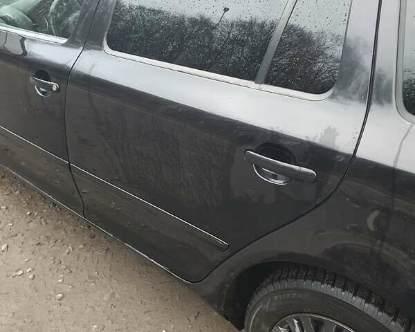 Черный Шкода Октавия, объемом двигателя 1.6 л и пробегом 220 тыс. км за 7950 $, фото 5 на Automoto.ua