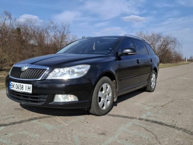 Черный Шкода Октавия, объемом двигателя 1.6 л и пробегом 250 тыс. км за 8000 $, фото 1 на Automoto.ua