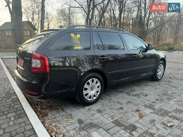 Черный Шкода Октавия, объемом двигателя 1.6 л и пробегом 243 тыс. км за 8350 $, фото 90 на Automoto.ua