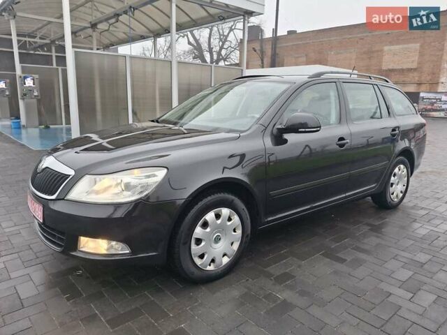 Чорний Шкода Октавія, об'ємом двигуна 1.6 л та пробігом 221 тис. км за 8600 $, фото 1 на Automoto.ua