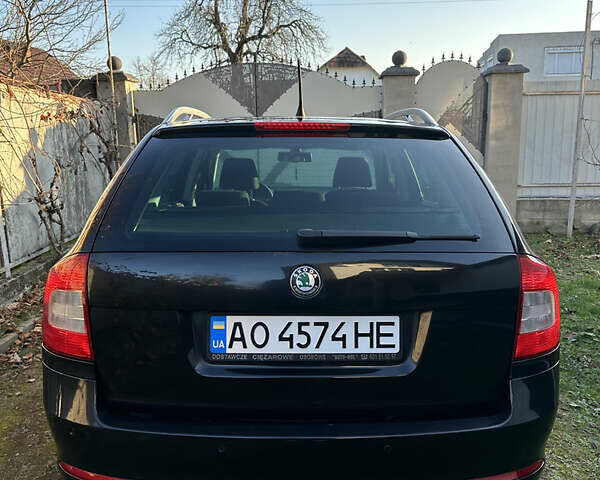 Черный Шкода Октавия, объемом двигателя 1.6 л и пробегом 200 тыс. км за 8800 $, фото 2 на Automoto.ua