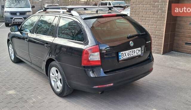 Черный Шкода Октавия, объемом двигателя 2 л и пробегом 296 тыс. км за 8500 $, фото 2 на Automoto.ua