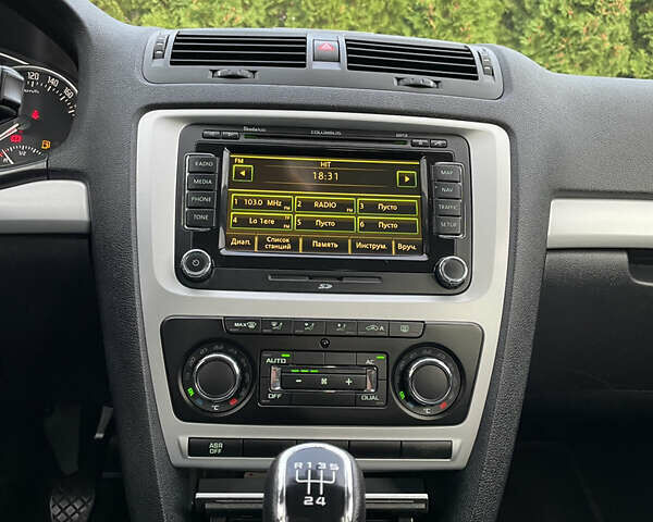 Чорний Шкода Октавія, об'ємом двигуна 1.6 л та пробігом 194 тис. км за 9399 $, фото 102 на Automoto.ua