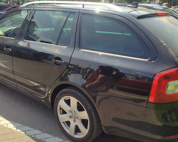 Чорний Шкода Октавія, об'ємом двигуна 1.2 л та пробігом 240 тис. км за 6600 $, фото 4 на Automoto.ua