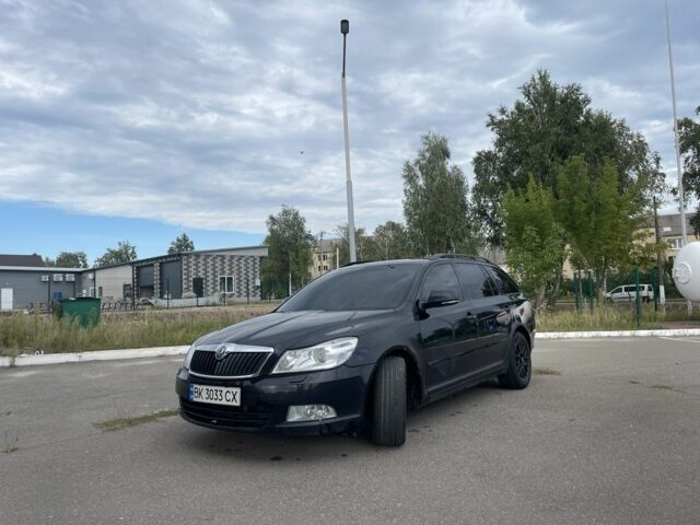 Черный Шкода Октавия, объемом двигателя 1.6 л и пробегом 295 тыс. км за 7400 $, фото 1 на Automoto.ua