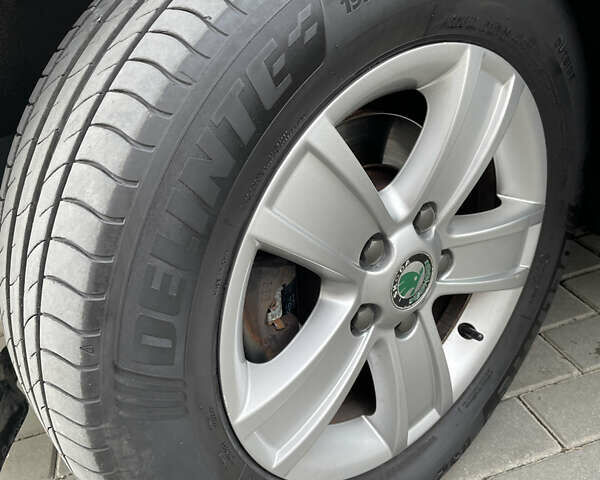 Чорний Шкода Октавія, об'ємом двигуна 1.6 л та пробігом 194 тис. км за 9399 $, фото 49 на Automoto.ua