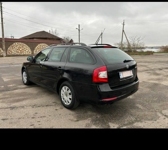Чорний Шкода Октавія, об'ємом двигуна 1.8 л та пробігом 230 тис. км за 6750 $, фото 2 на Automoto.ua