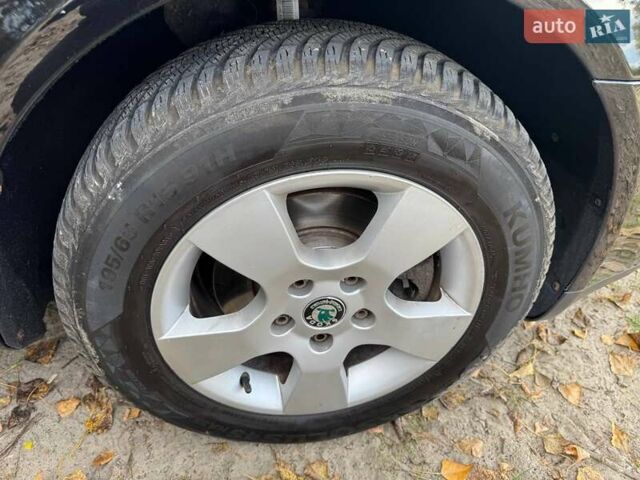 Шкода Октавия 2011 в Полтаве на Automoto.ua Черный Шкода Октавия, объемом двигателя 1.6 л и пробегом 220 тыс. км за 7600 $, фото 64 на Automoto.ua