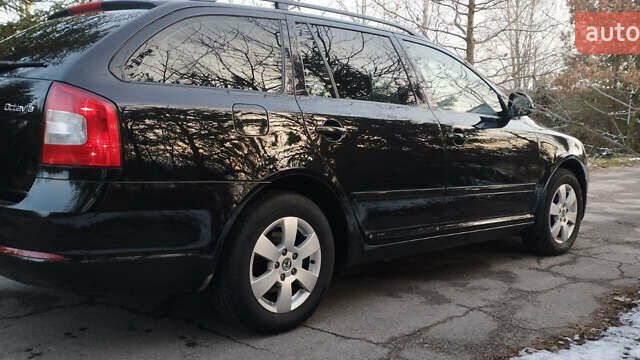 Черный Шкода Октавия, объемом двигателя 1.4 л и пробегом 231 тыс. км за 6999 $, фото 1 на Automoto.ua