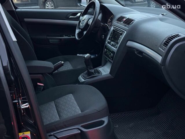 Черный Шкода Октавия, объемом двигателя 1.6 л и пробегом 237 тыс. км за 8190 $, фото 18 на Automoto.ua