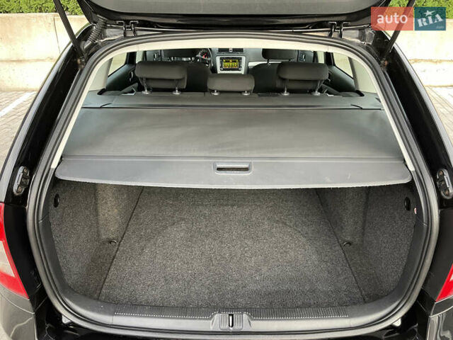 Чорний Шкода Октавія, об'ємом двигуна 1.6 л та пробігом 194 тис. км за 9399 $, фото 70 на Automoto.ua