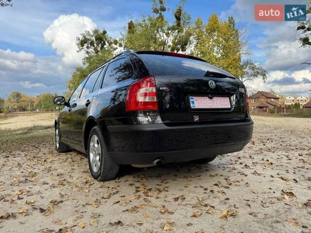 Шкода Октавия 2011 в Полтаве на Automoto.ua Черный Шкода Октавия, объемом двигателя 1.6 л и пробегом 220 тыс. км за 7600 $, фото 23 на Automoto.ua