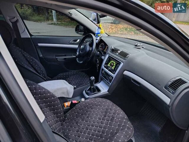 Шкода Октавія 2011 у Борисполе на Automoto.ua Чорний Шкода Октавія, об'ємом двигуна 1.6 л та пробігом 348 тис. км за 8700 $, фото 11 на Automoto.ua