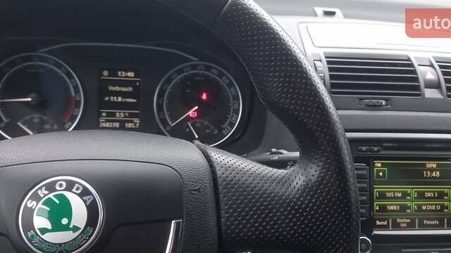 Черный Шкода Октавия, объемом двигателя 2 л и пробегом 267 тыс. км за 11300 $, фото 1 на Automoto.ua