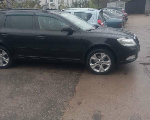 Черный Шкода Октавия, объемом двигателя 2 л и пробегом 306 тыс. км за 10200 $, фото 1 на Automoto.ua