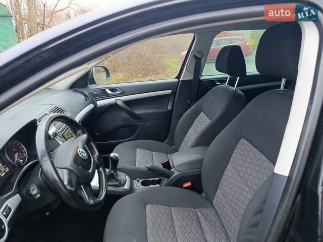 Черный Шкода Октавия, объемом двигателя 1.2 л и пробегом 209 тыс. км за 5499 $, фото 9 на Automoto.ua