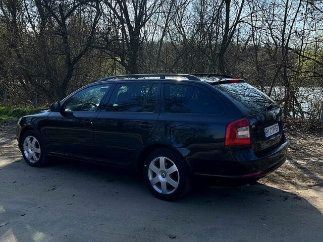 Чорний Шкода Октавія, об'ємом двигуна 1.4 л та пробігом 214 тис. км за 7600 $, фото 5 на Automoto.ua