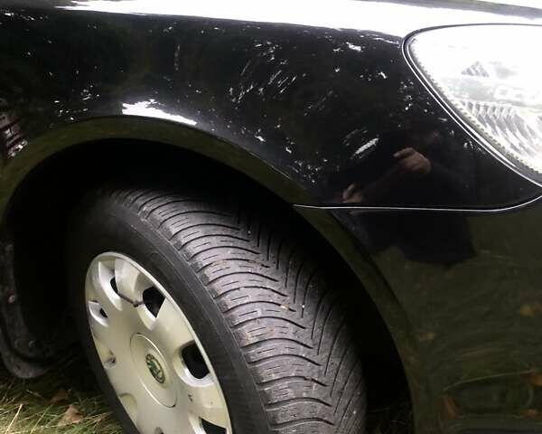 Черный Шкода Октавия, объемом двигателя 1.6 л и пробегом 184 тыс. км за 8900 $, фото 6 на Automoto.ua