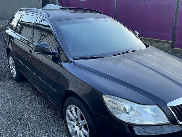 Шкода Октавія 2011 у Подільськ (Котовськ) на Automoto.ua Чорний Шкода Октавія, об'ємом двигуна 1.4 л та пробігом 211 тис. км за 7100 $, фото 5 на Automoto.ua