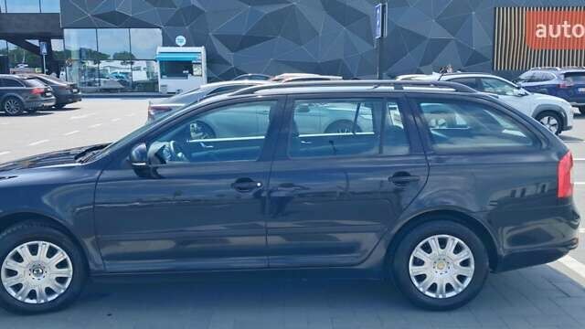 Черный Шкода Октавия, объемом двигателя 1.6 л и пробегом 276 тыс. км за 8100 $, фото 2 на Automoto.ua