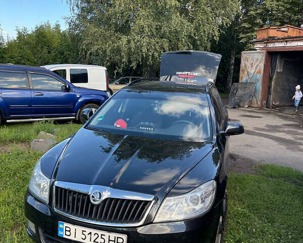 Шкода Октавия 2011 в Полтаве на Automoto.ua Черный Шкода Октавия, объемом двигателя 1.97 л и пробегом 254 тыс. км за 10500 $, фото 1 на Automoto.ua