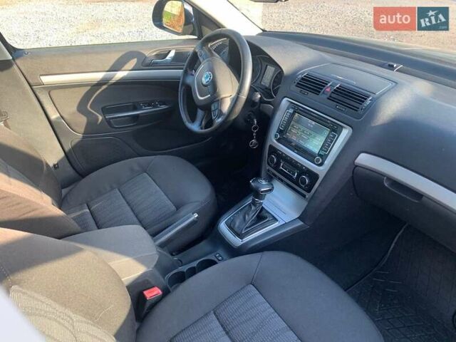 Чорний Шкода Октавія, об'ємом двигуна 1.2 л та пробігом 210 тис. км за 7500 $, фото 4 на Automoto.ua
