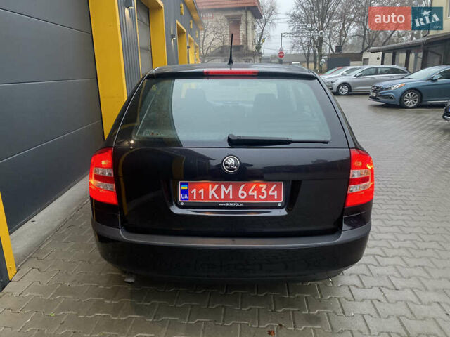 Черный Шкода Октавия, объемом двигателя 1.6 л и пробегом 198 тыс. км за 6999 $, фото 24 на Automoto.ua