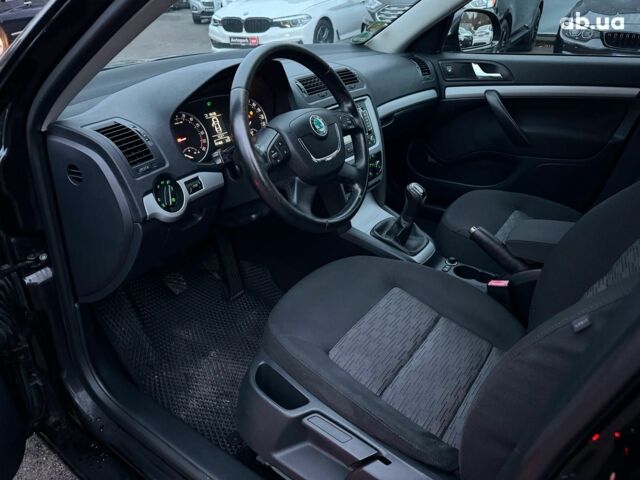 Черный Шкода Октавия, объемом двигателя 1.6 л и пробегом 237 тыс. км за 8190 $, фото 12 на Automoto.ua