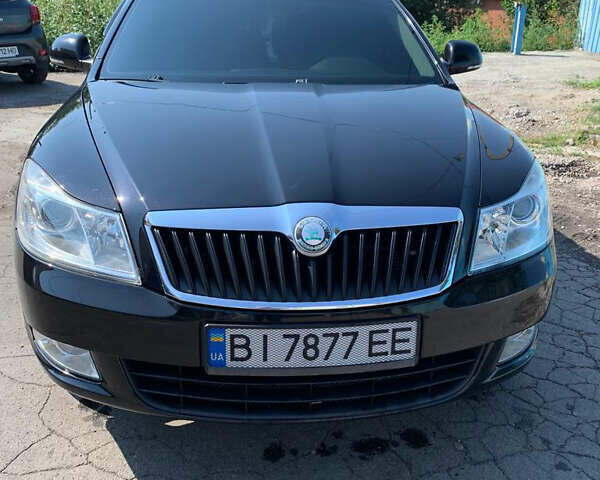 Чорний Шкода Октавія, об'ємом двигуна 1.8 л та пробігом 165 тис. км за 10500 $, фото 1 на Automoto.ua