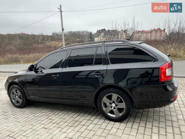 Черный Шкода Октавия, объемом двигателя 2 л и пробегом 234 тыс. км за 8899 $, фото 10 на Automoto.ua